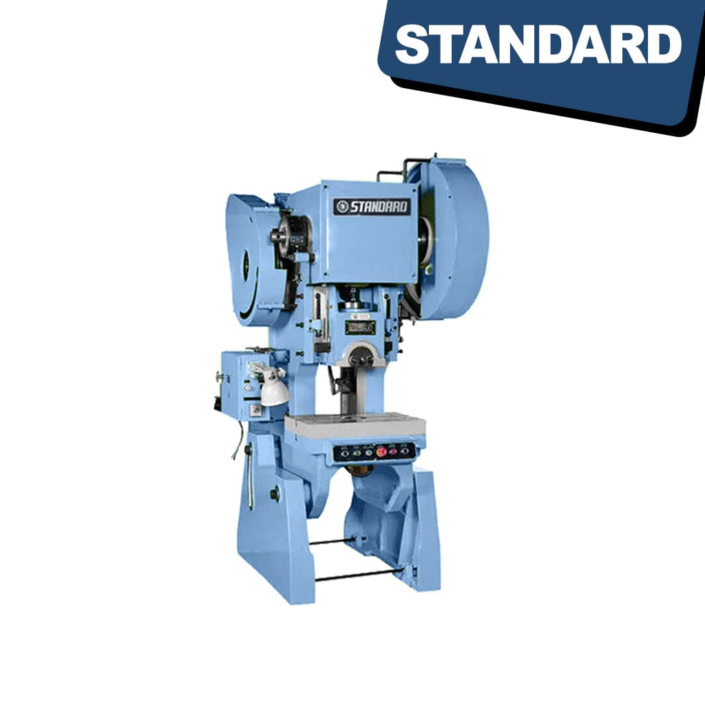 The STANDARD EPA-25P Eccentric Press is a mechanical machine with adjustable stroke and a pneumatic clutch. The press appears to have a sturdy metal frame with various control knobs and levers. The adjustable stroke feature allows for flexibility in the pressing operation. The pneumatic clutch ensures smooth and efficient performance by controlling the power transmission. Overall, it is a specialized machine designed for industrial use.